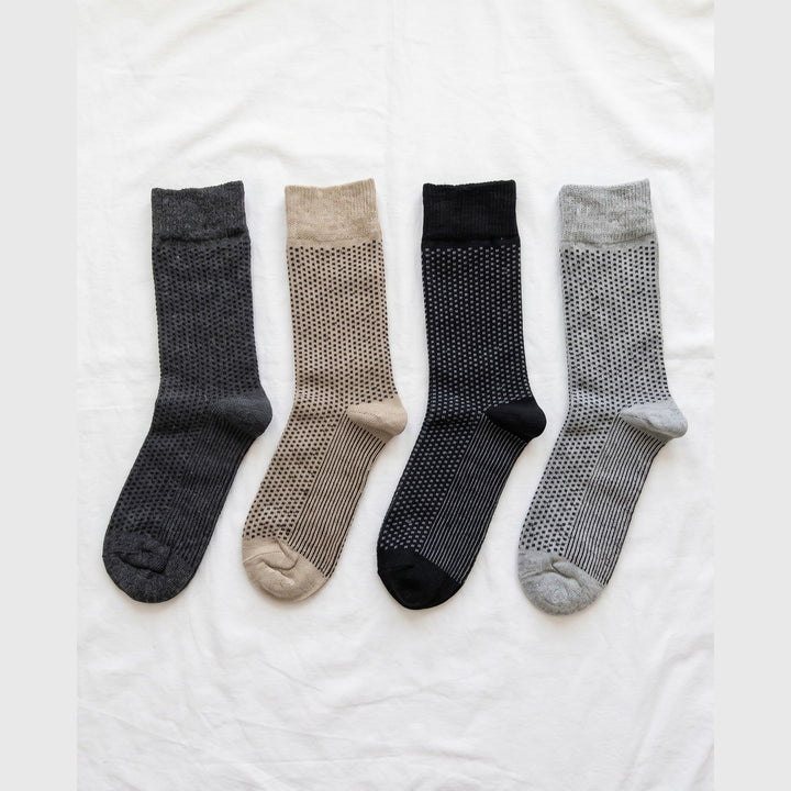 Louluu Birdseye lambswool crew socks in charcoal, beige, black and grey — flat lay