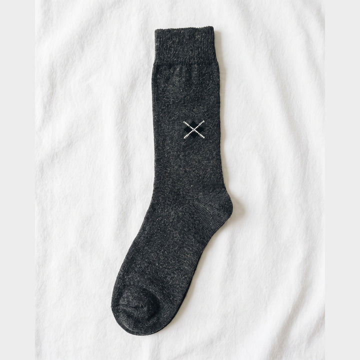 Louluu Diamond Stitch charcoal lambswool sock with small embroidered diamond emblem — flat lay