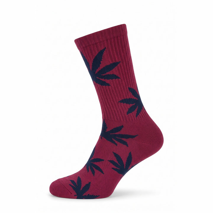 Burgundy cushioned cotton crew sock with navy leaf motifs — side view