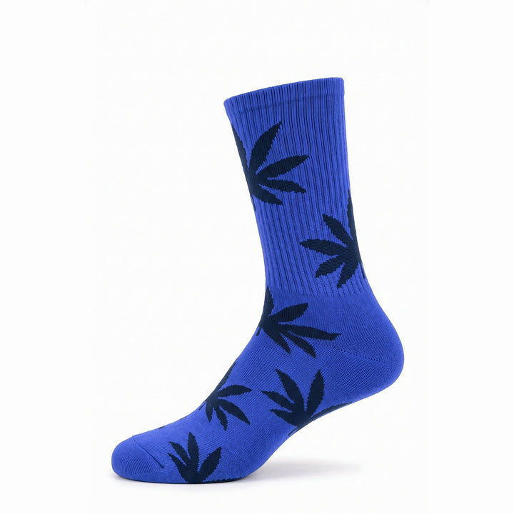 Royal blue cushioned cotton crew sock with navy leaf motifs — side view
