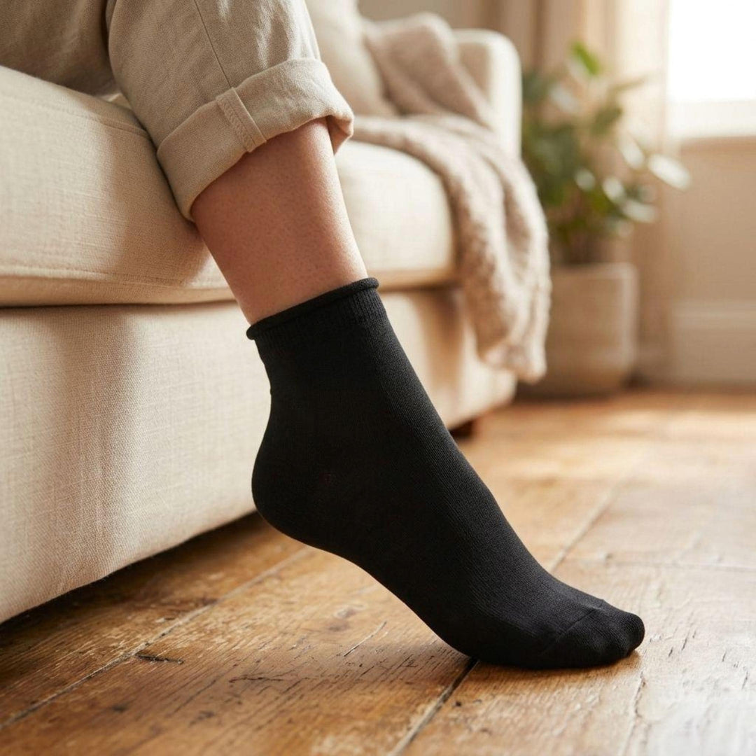 Louluu women's black bamboo no-mark ankle socks worn at home — non-elastic wide top that leaves no marks